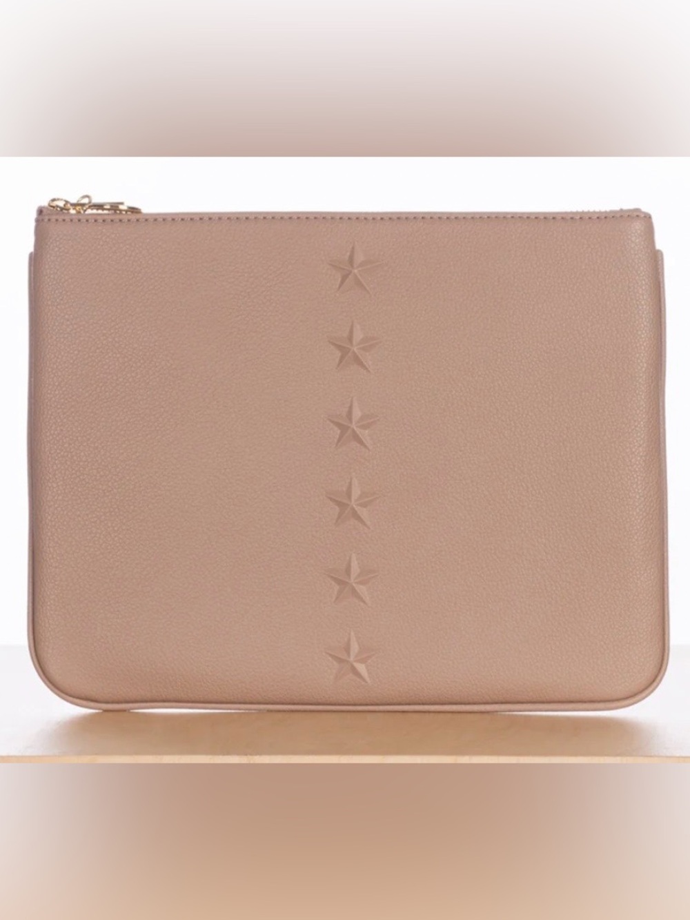 ELA Pebbled Leather Star-Detail Clutch. Can be use as a makeup bag.